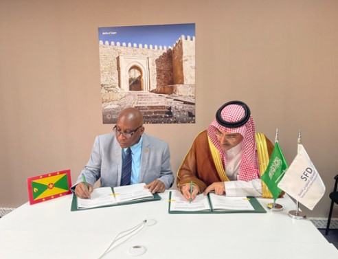 SFD CEO, H.E. Sultan Al-Marshad, and Minister of Finance of Grenada, Hon. Dennis Cornwall, signed the first development loan agreement between SFD and Grenada (Photo: AETOSWire)