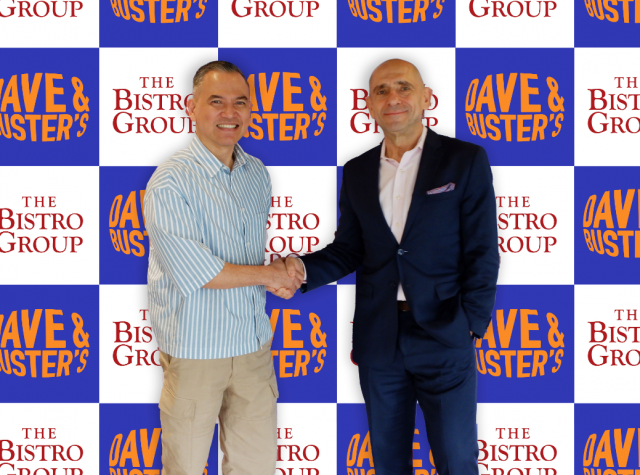 Antonio Bautista, Chief International Development Officer of Dave &amp; Buster’s and Paul Manuud, President of The Bistro Group (Photo: Business Wire)