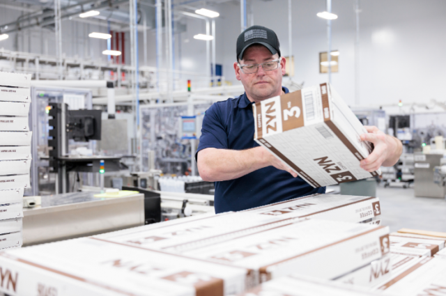 A Swedish Match employee packaging ZYN oral nicotine pouches at the Owensboro, Ky., facility. (Photo: Business Wire)